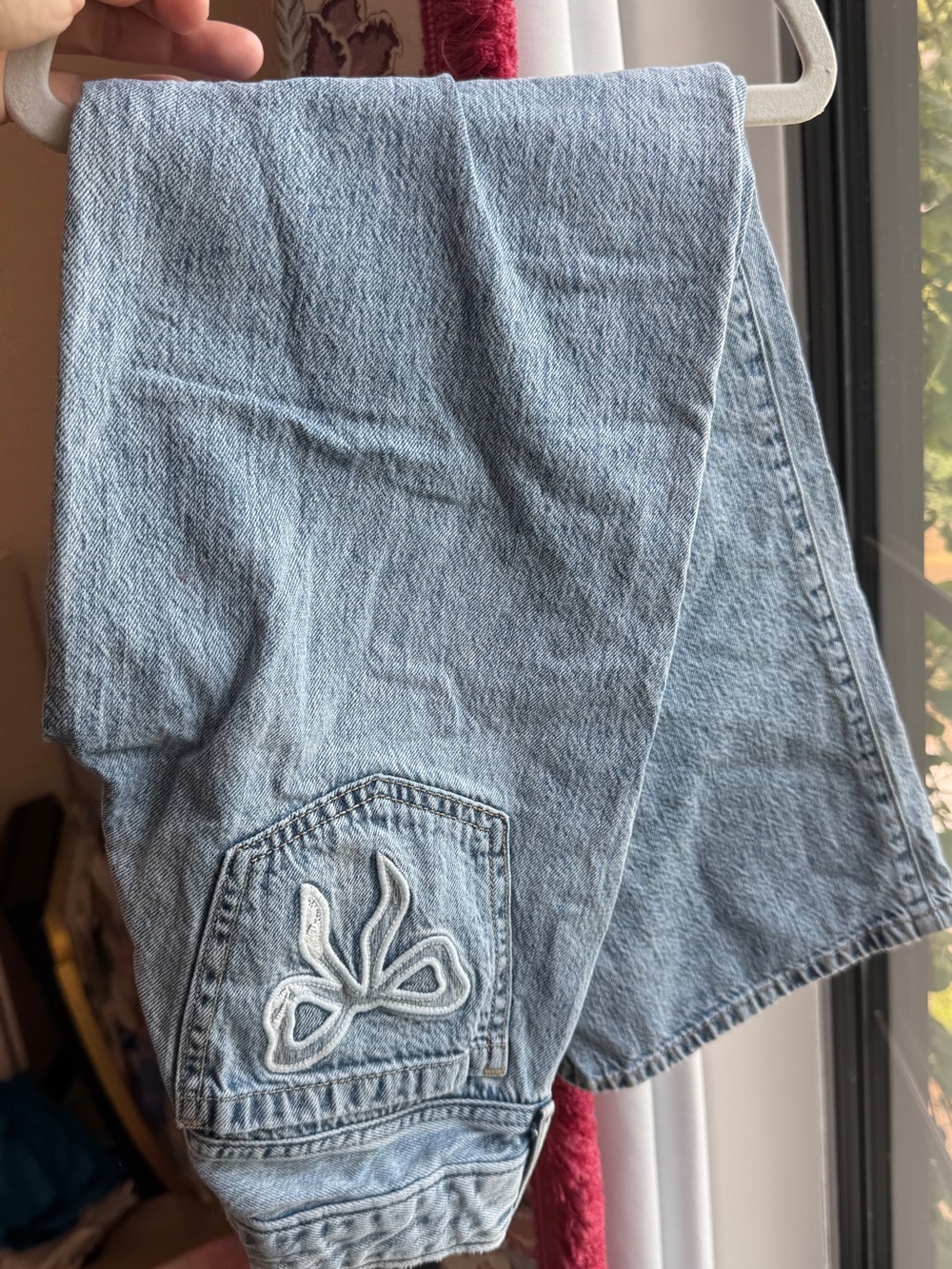 Light Wash Denim Jeans with Embroidered Bow Back Pocket